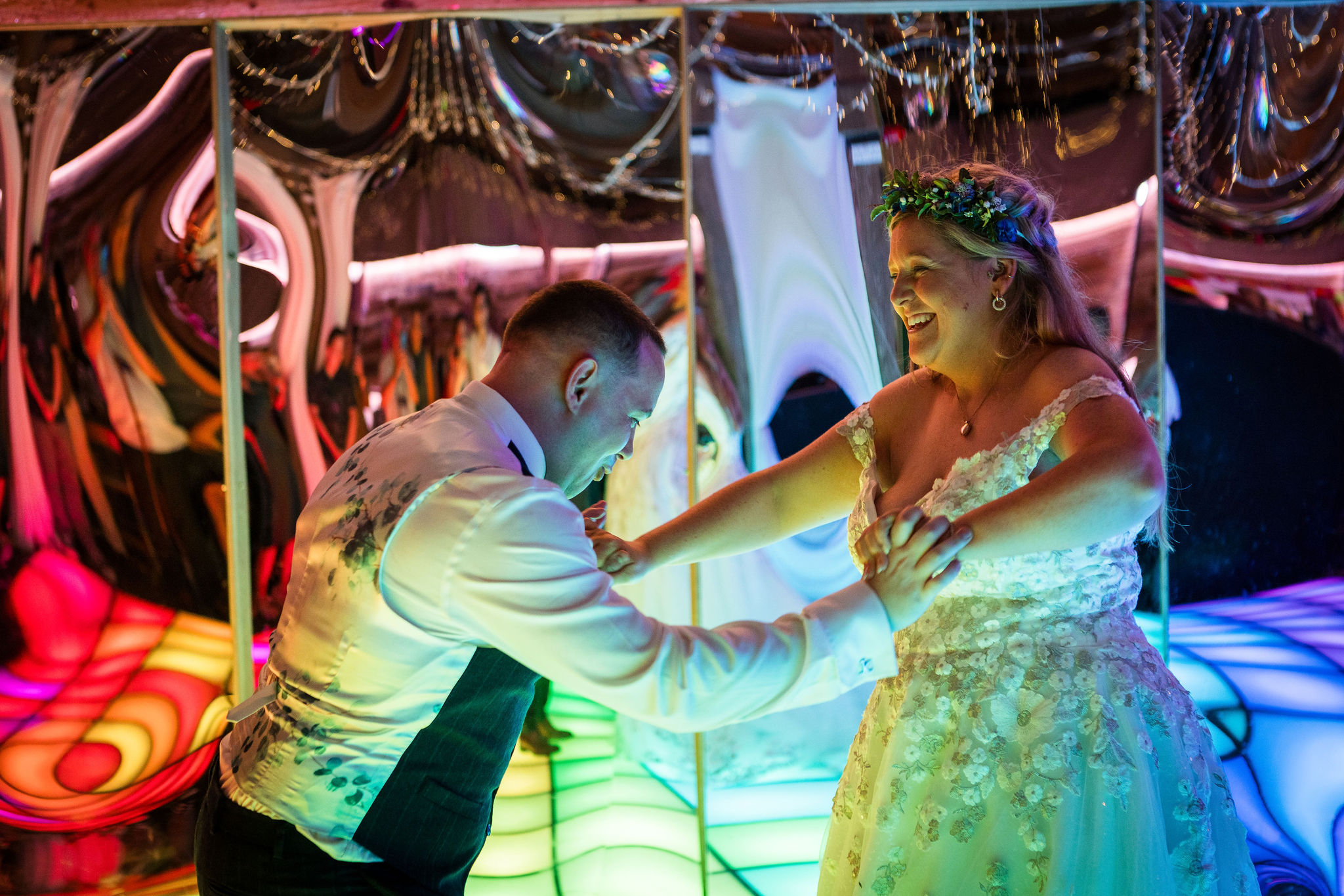 bride and groom first dance at summer festival wedding