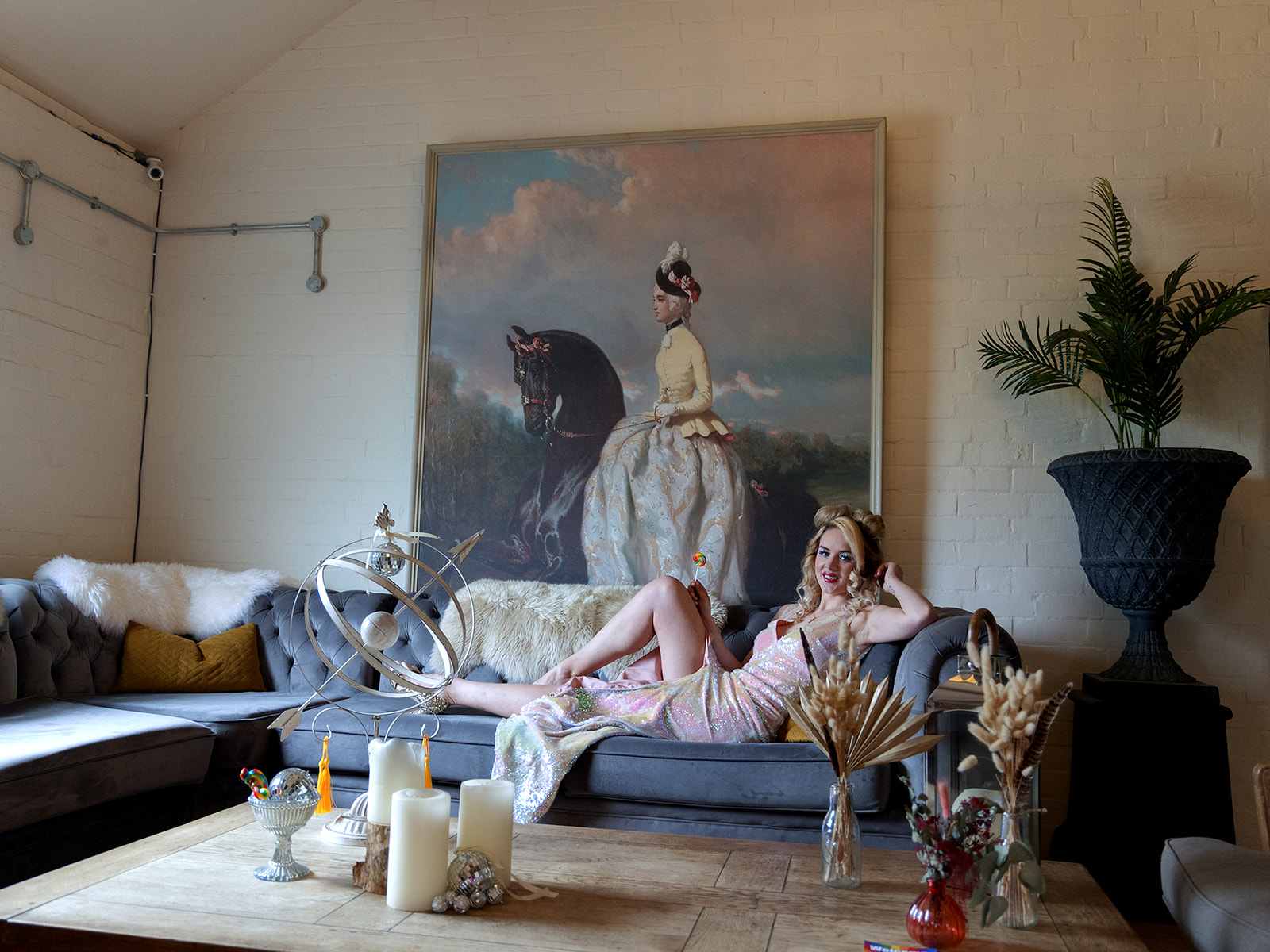 wedding photo of bride wearing pink sparkly wedding dress with leg split