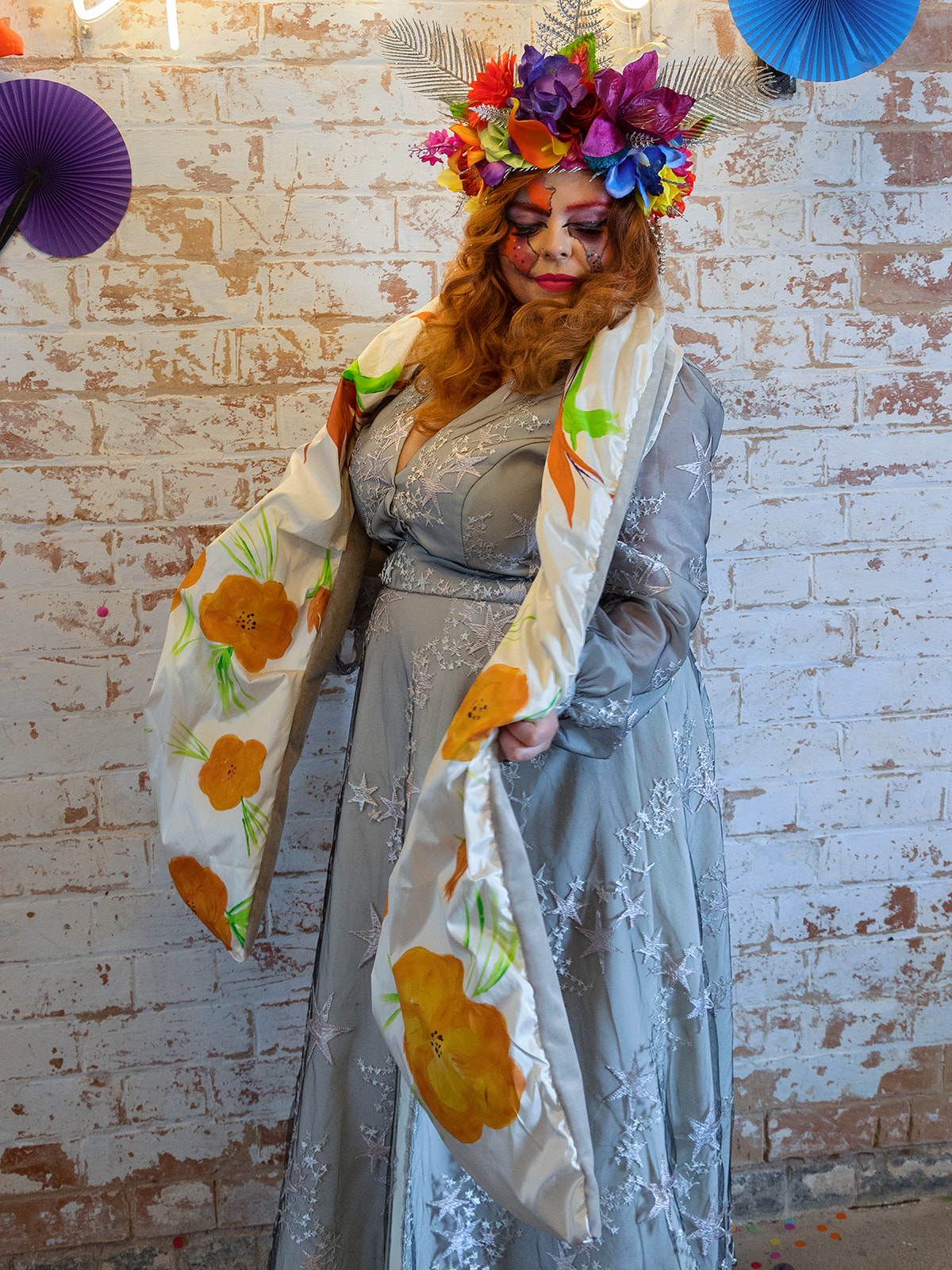 bride wearing colourful headdress and celestial wedding dress