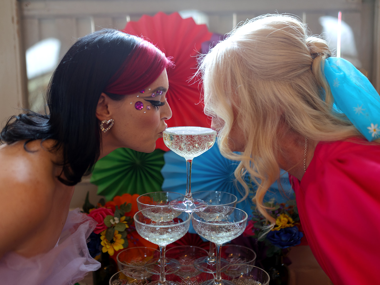 fun champagne tower photo from colourful wedding styled shoot