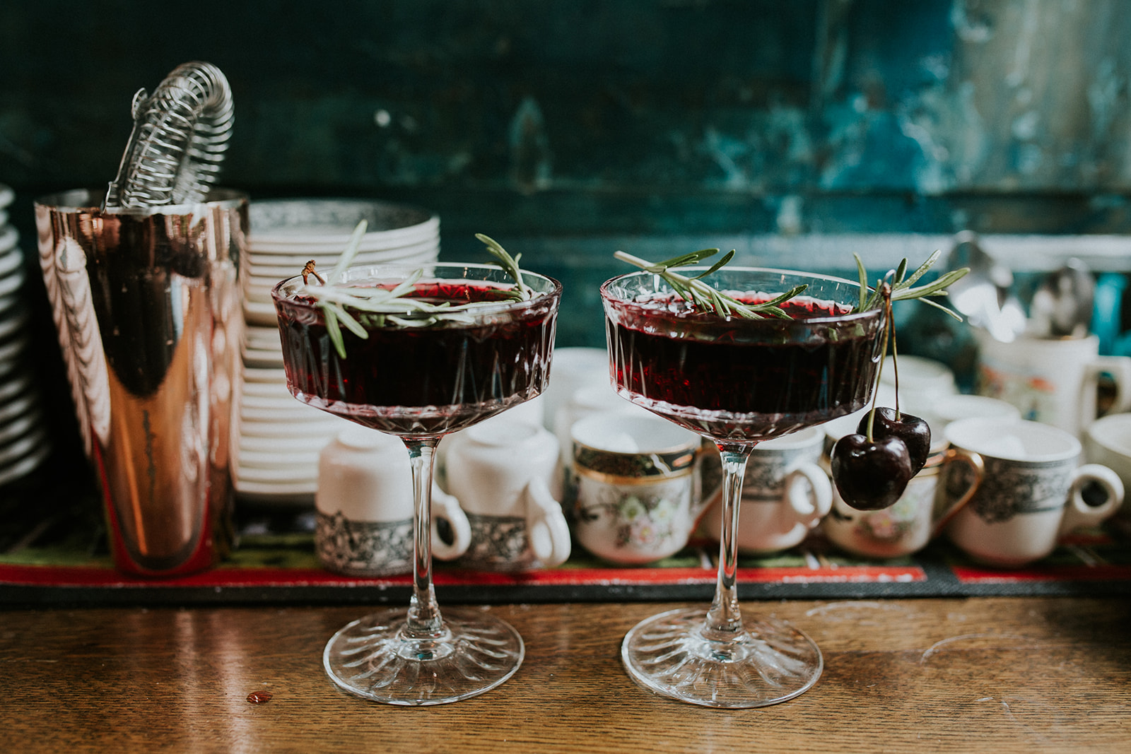 detail shot of cherry red cocktails for cherry red winter wedding