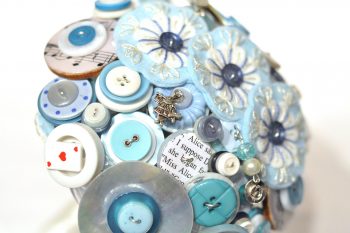 Alice in Wonderland wedding inspiration - custom bouquet with alice charms - alternative and unconventional wedding