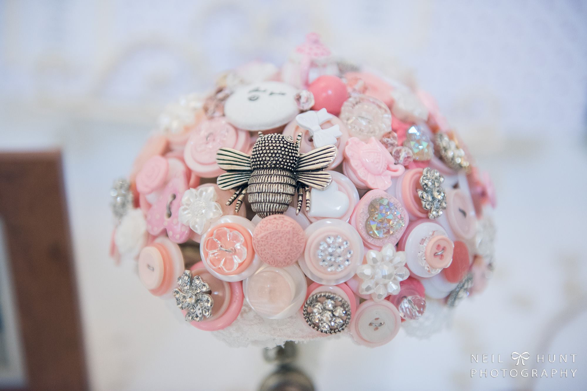 Alice in Wonderland wedding inspiration - button bouquet with bee - alternative and unconventional wedding