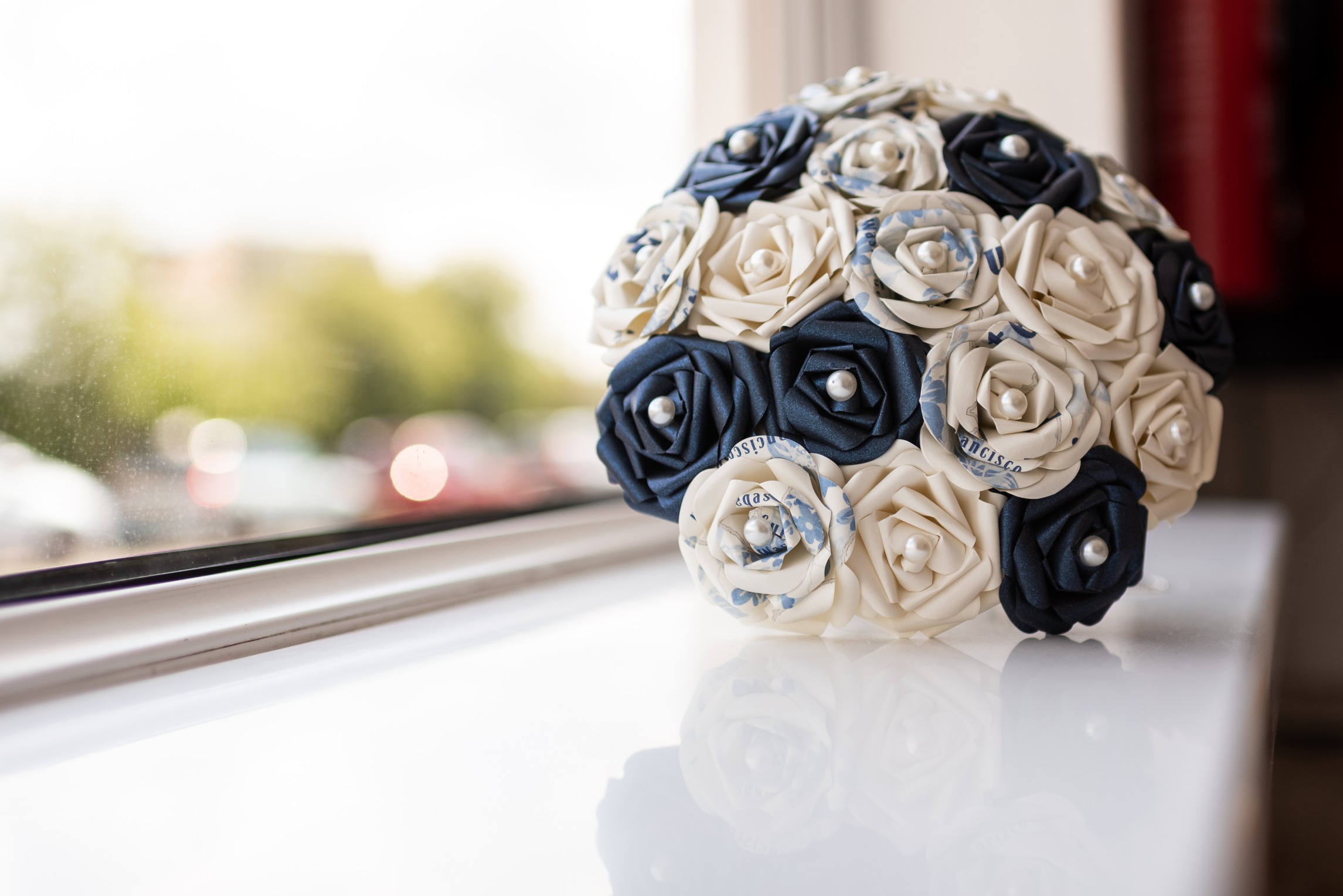 Alternative wedding bouquet with blue and white roses from dave fuller photography