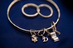 Sterling Silver Charm Bracelet & Rings, Photo by Doodah Photography