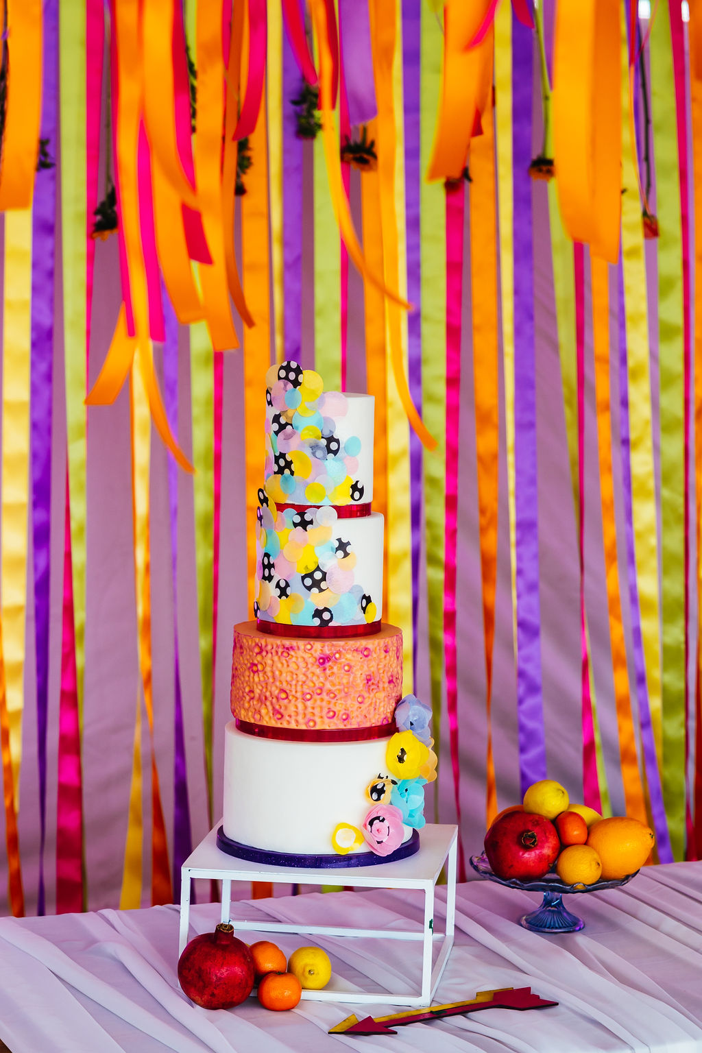 colourful wedding cake - festival wedding cake by Big Day Blooms and Cakes