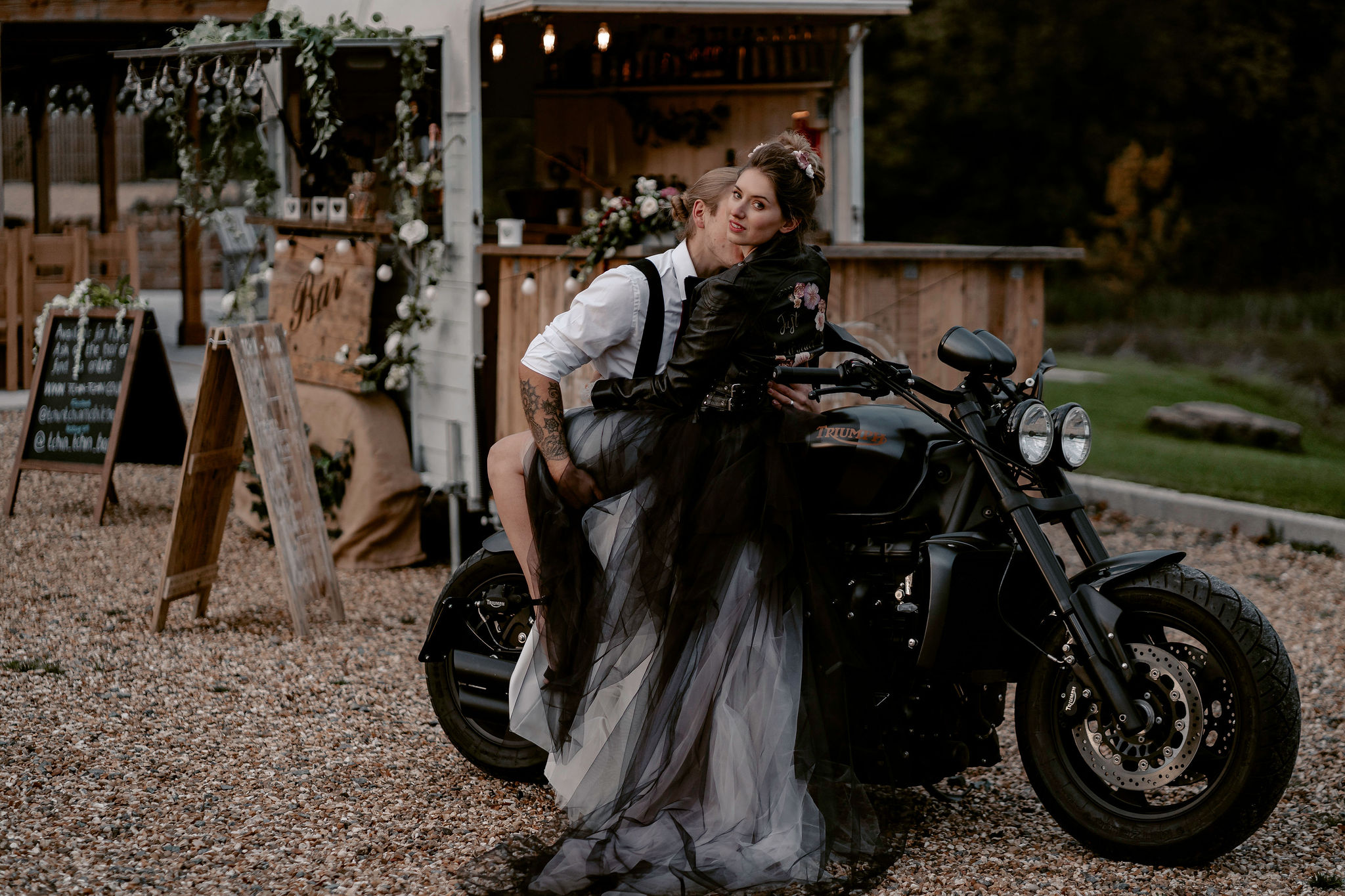 Ryley and Flynn - alternative wedding dress - black and white wedding dress on motorbike - awesome black wedding gown