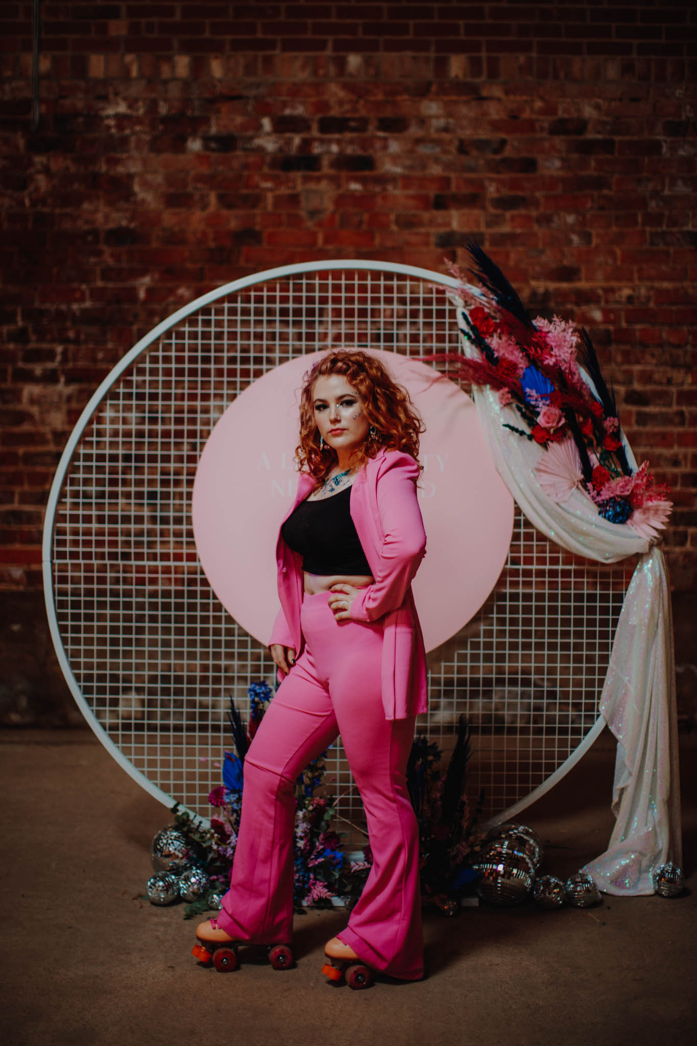 roller disco wedding - 80s wedding - bridal suit - hot pink bridal suit - alternative bridal wear