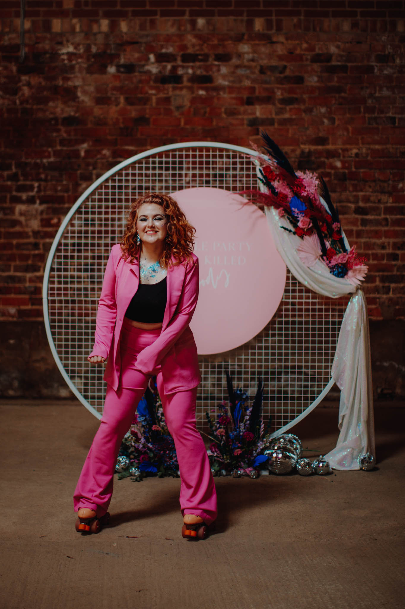 roller disco wedding - bridal suit - bridal power suit - bride in pink suit - 80s wedding