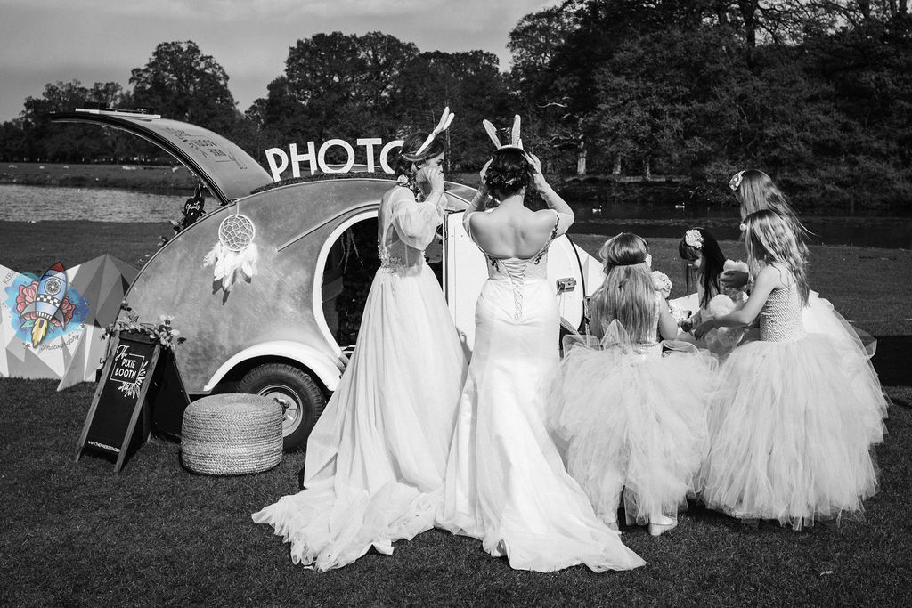 Kirsty rockett photography with pixie the photobooth - wedding photobooth teardrop caravan with bridal party