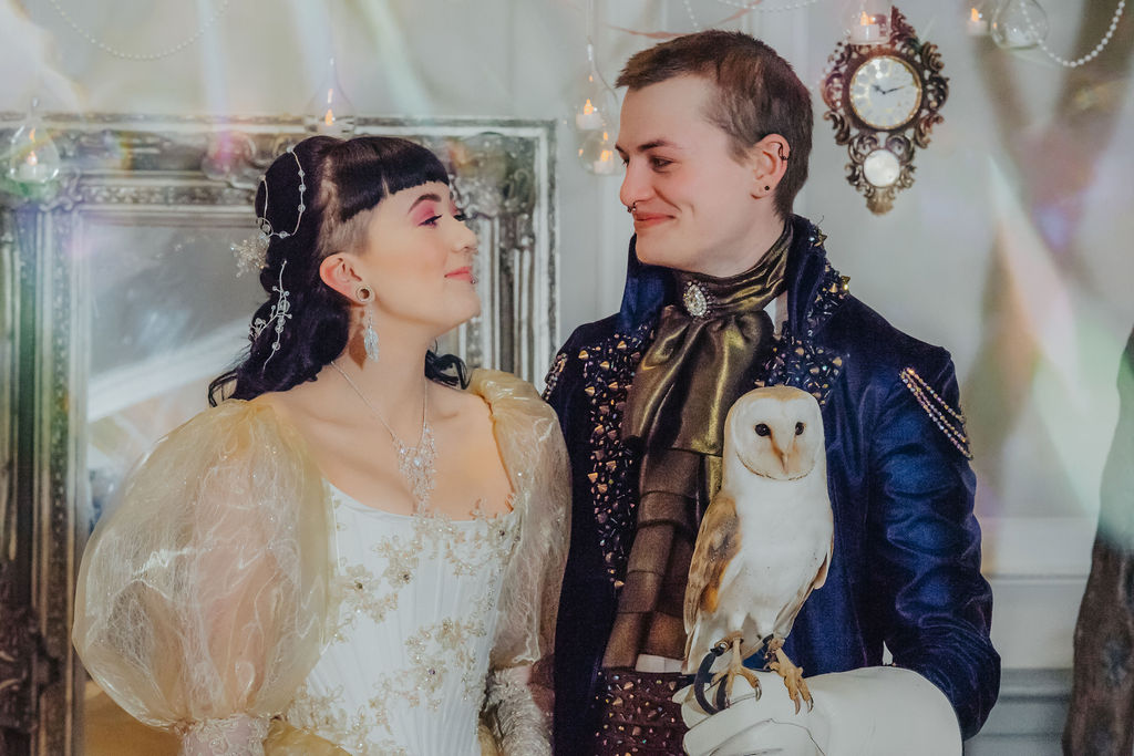 Bride and Groom getting married with Owl in hand - Labyrinth themed wedding day 2 - quirky and alternative wedding days