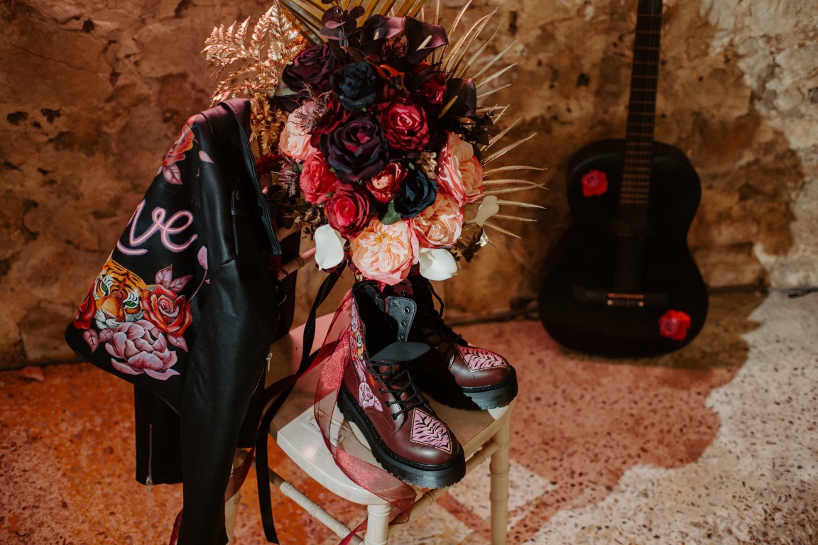 rock and roll wedding - edgy wedding inspiration - gothic wedding accessories - alternative wedding accessories - bridal leather jacket - alternative wedding flowers - wedding doc martens