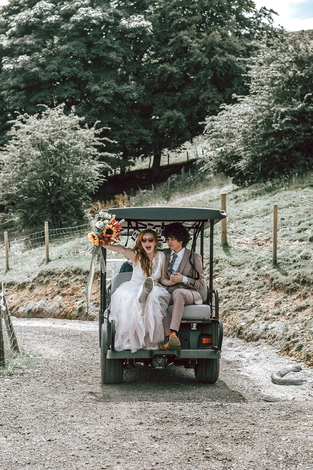 rustic festival wedding - wedding golf buggy - fun wedding ideas