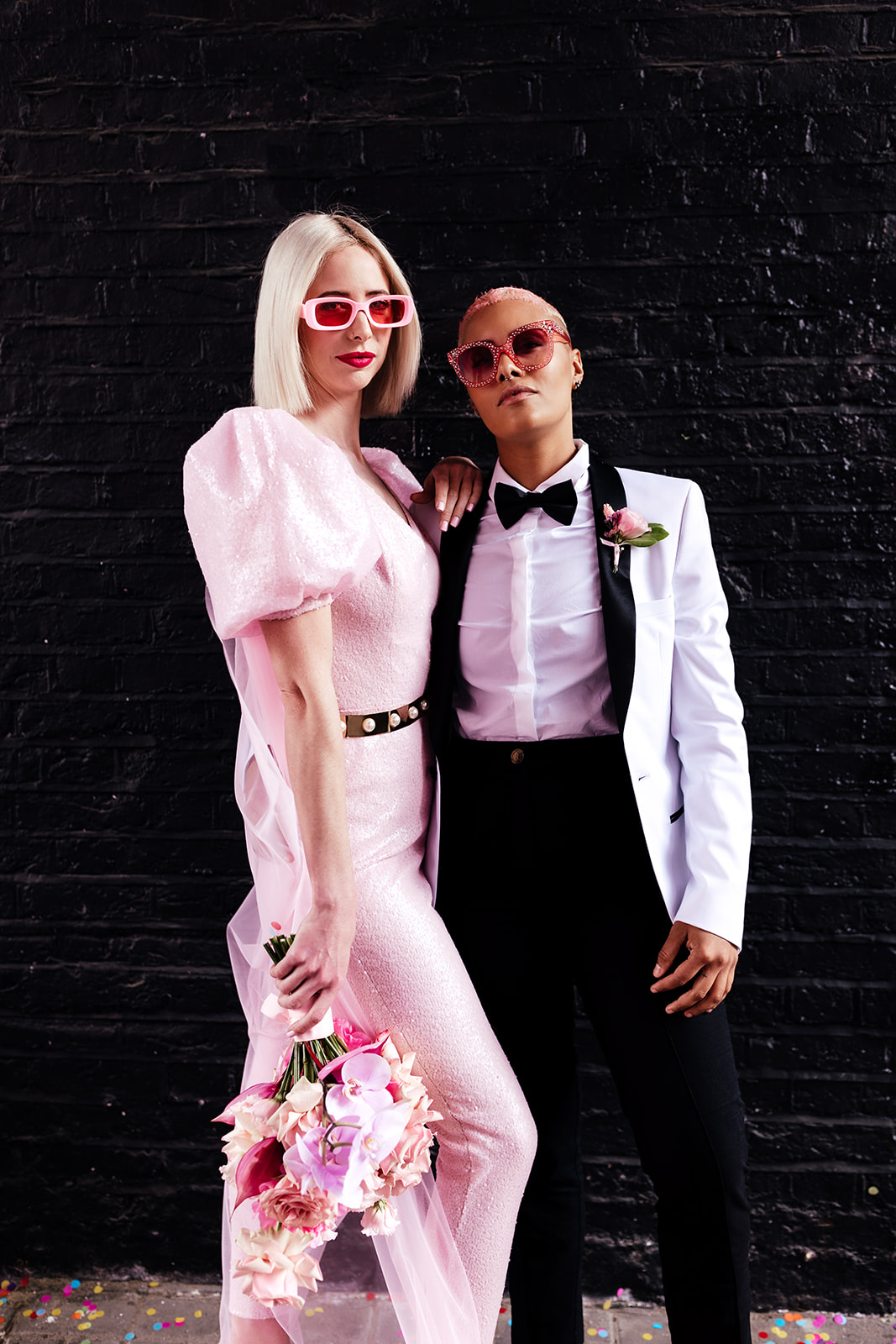 modern city elopement - alternative bridal wear - pink bridal jumpsuit - bridal tuxedo - same sex wedding outfits