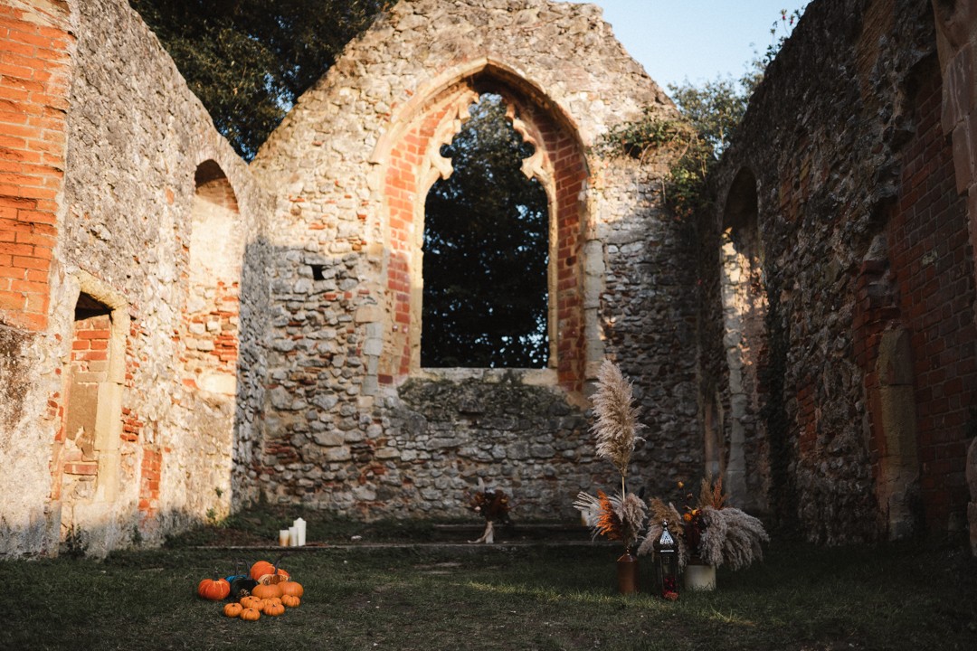 autumn elopement wedding ideas - wedding ceremony styling with pumpkins and pampas grass