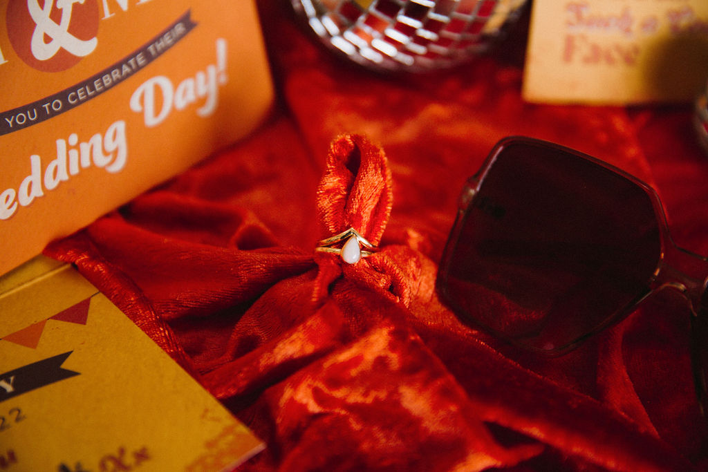 unique wedding ring on orange velvet cloth