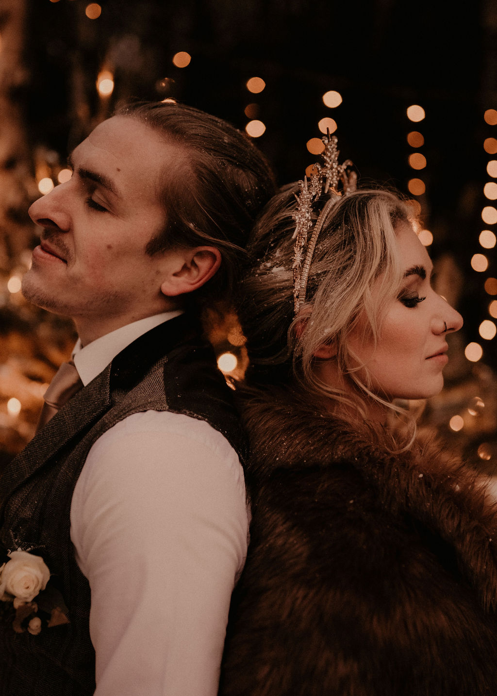 winter wedding shoot - couples standing back to back