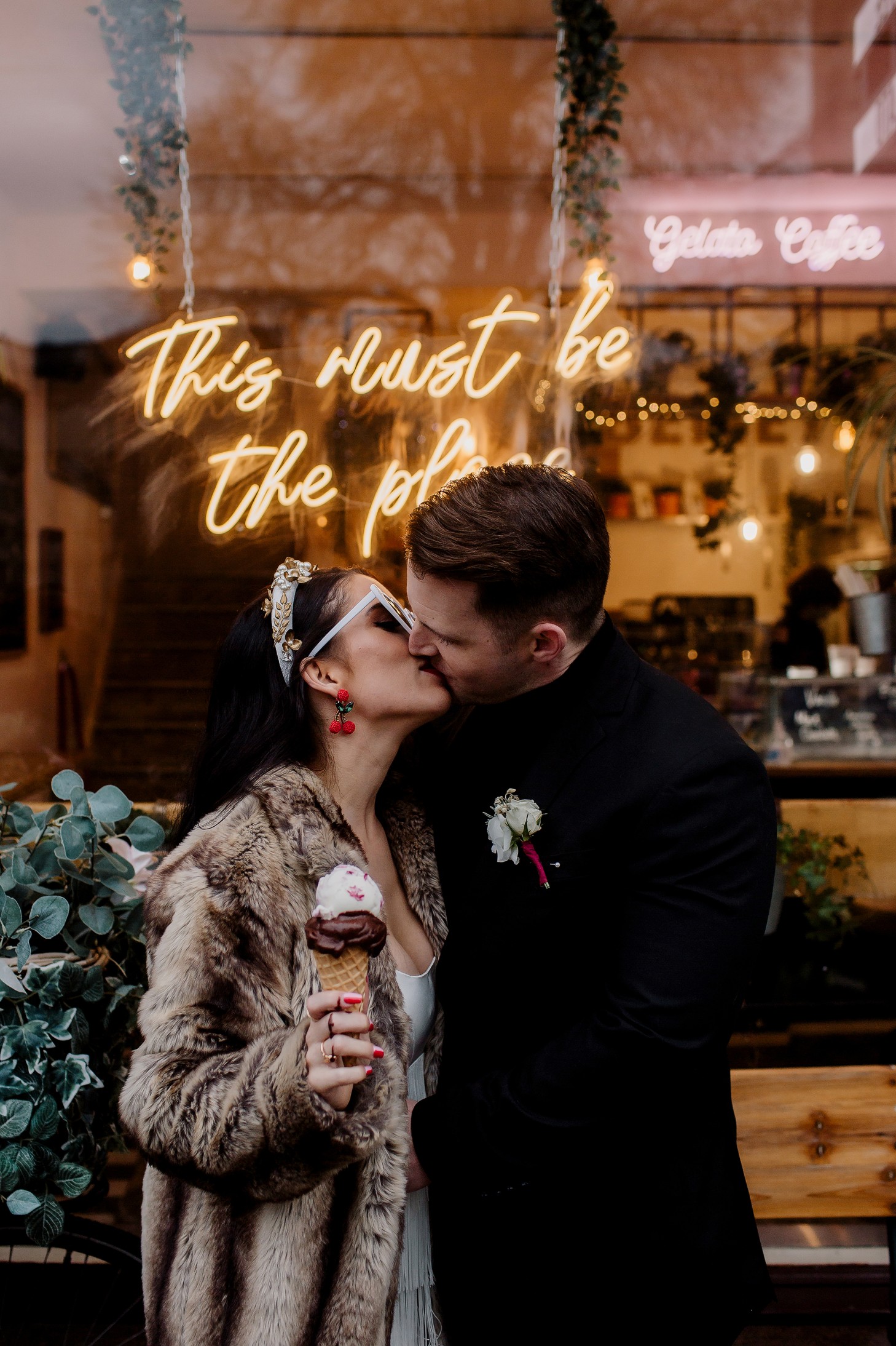 bride and groom outside gelato shop - fun winter wedding in Cambridge - city elopement - winter elopement - urban wedding ideas