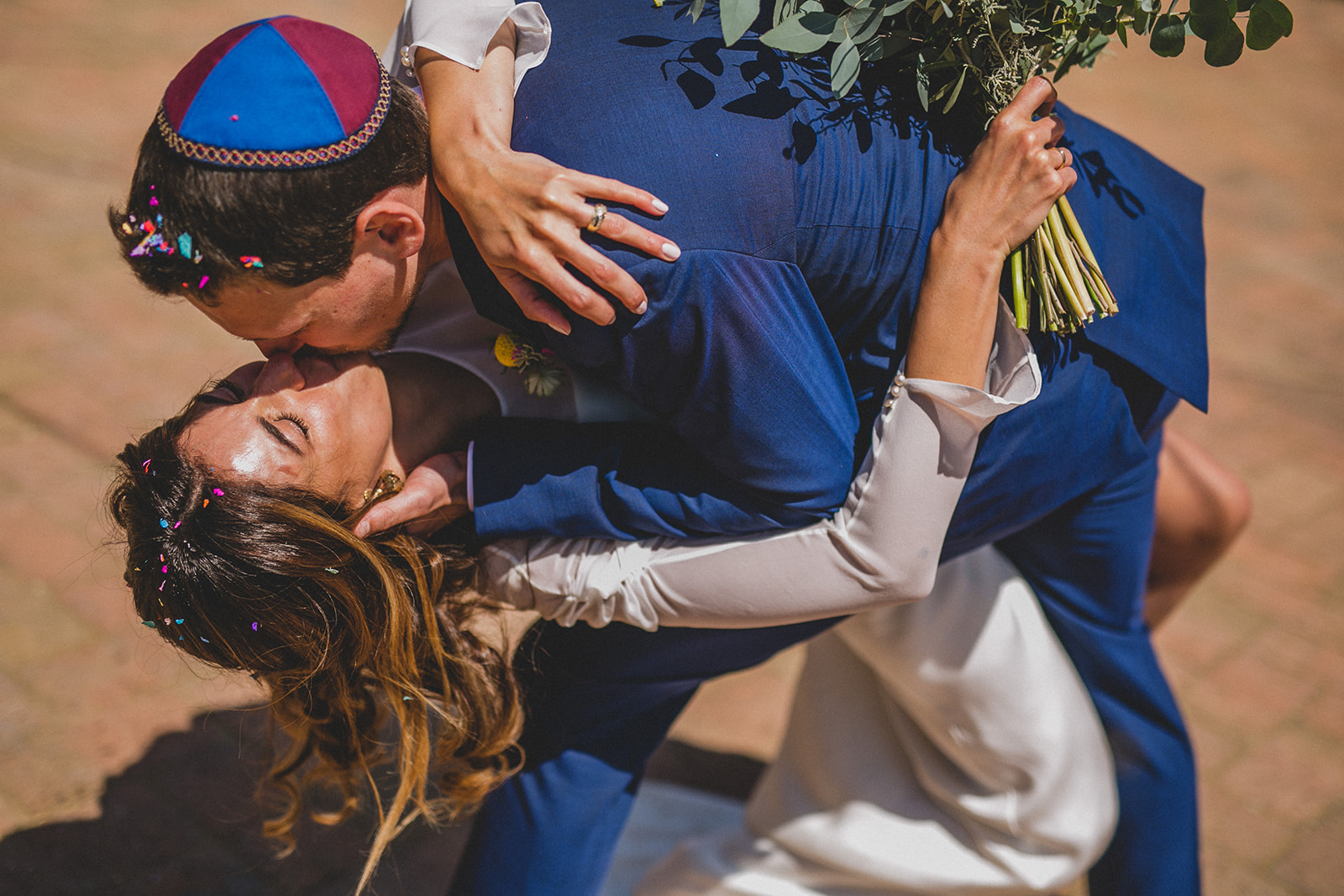 jewish bride and groom kissing - real wedding inspiration - unconventional wedding