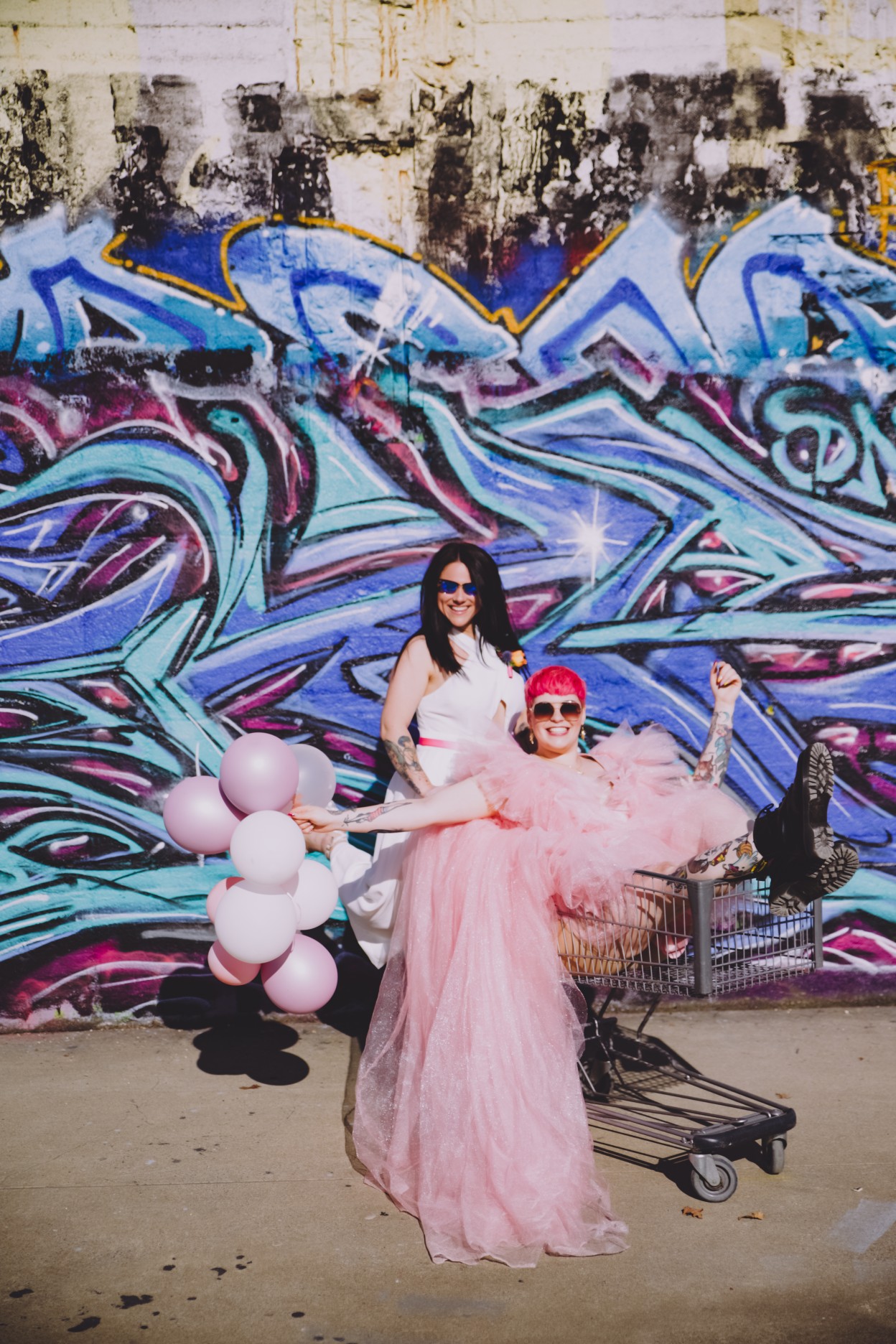 fun wedding photo ideas - pink tulle wedding dress - bold bridalwear