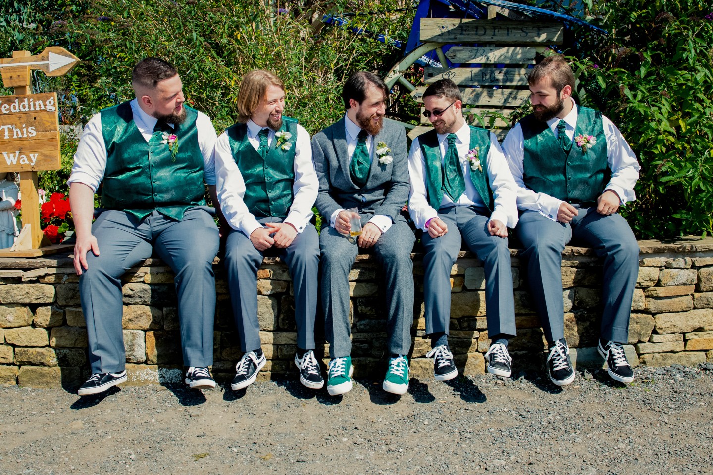 groomsmen in green waistcoats - unique grooms wear - unique groomsmen ideas