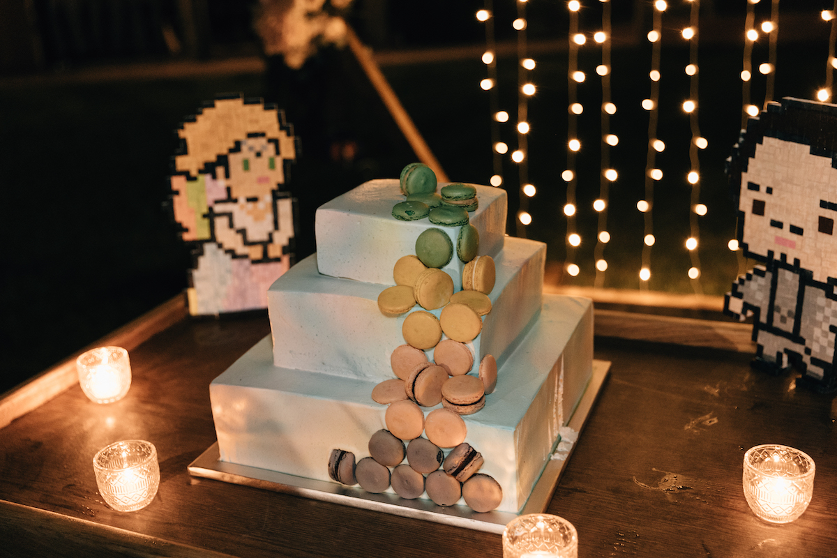 square pastel wedding cake with rainbow macaroons for pixel rainbow wedding