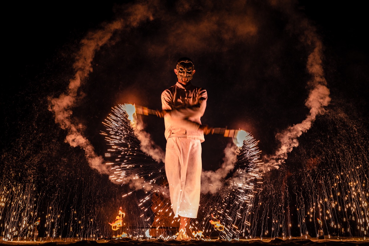fire performer at thailand destination wedding
