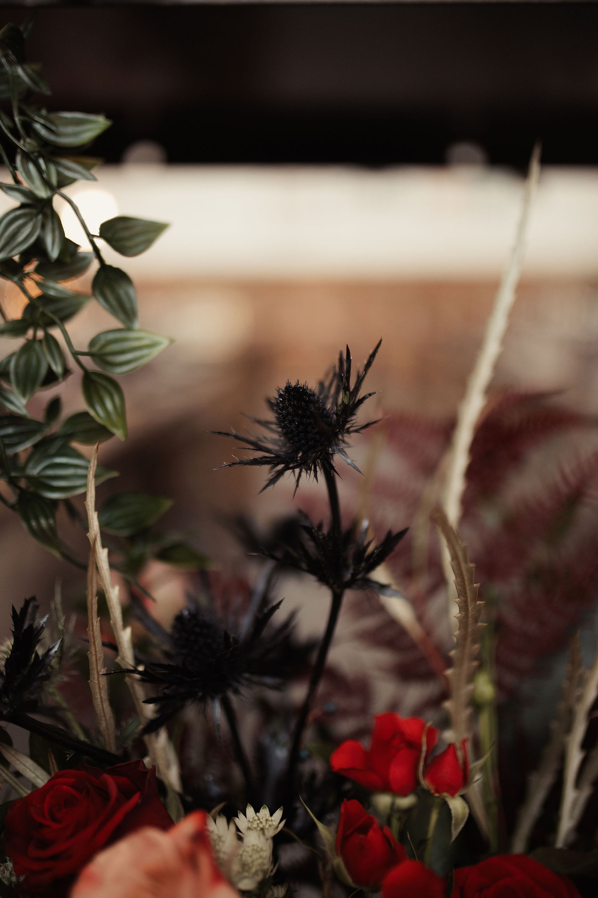 alternative wedding flowers with red roses and black flowers
