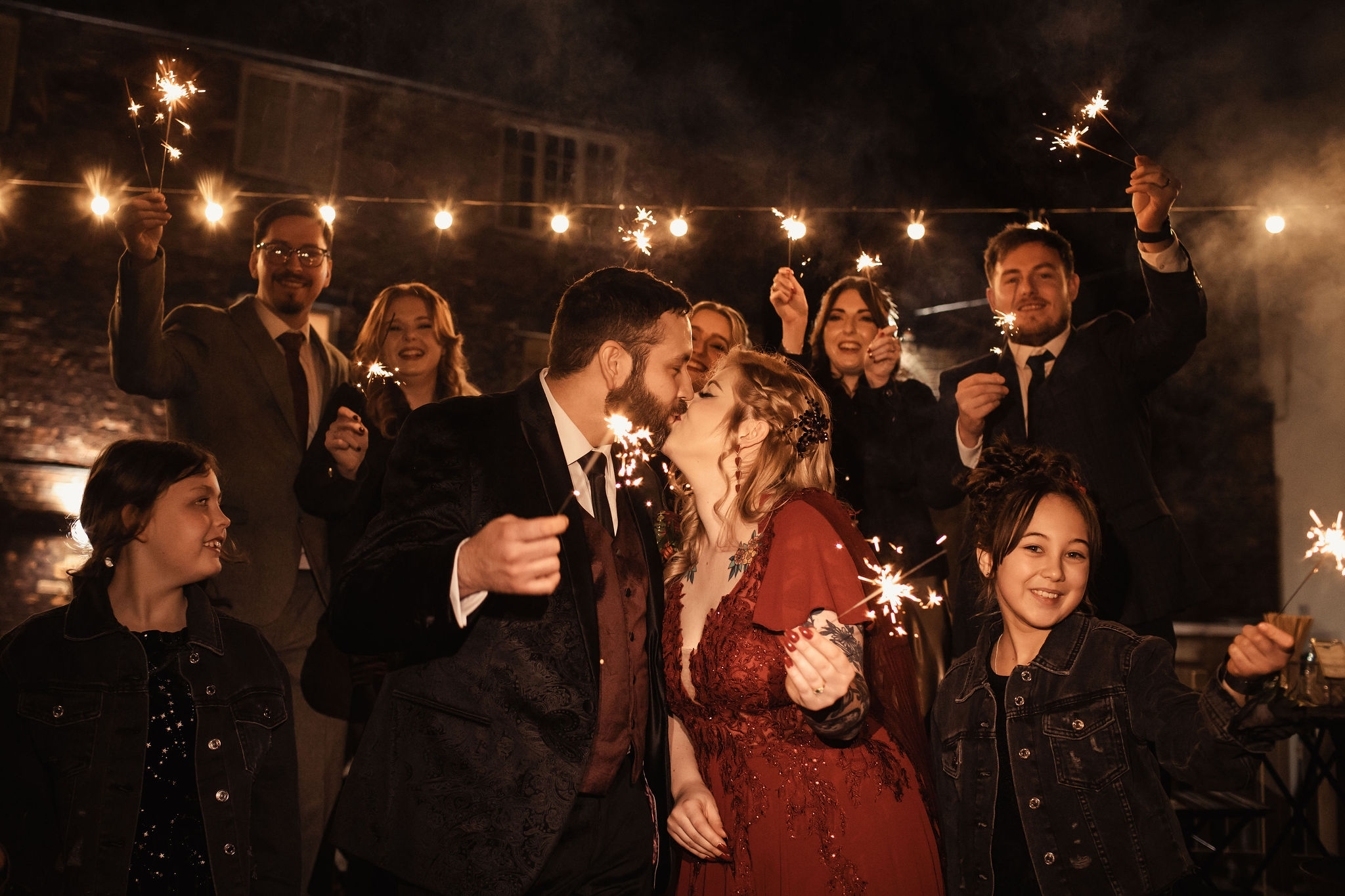 fun wedding photo at nighttime with sparklers
