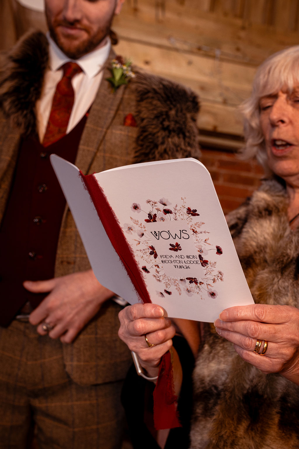 wedding celebrant reads vows at viking inspired wedding