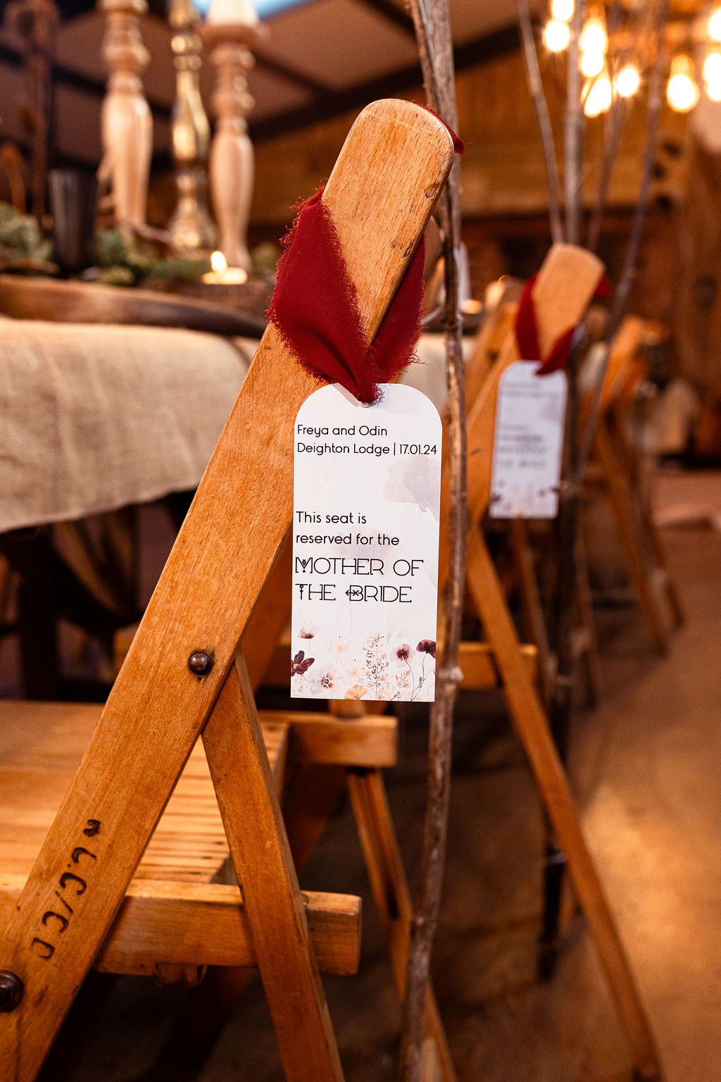 wedding stationery place names attached to each chair