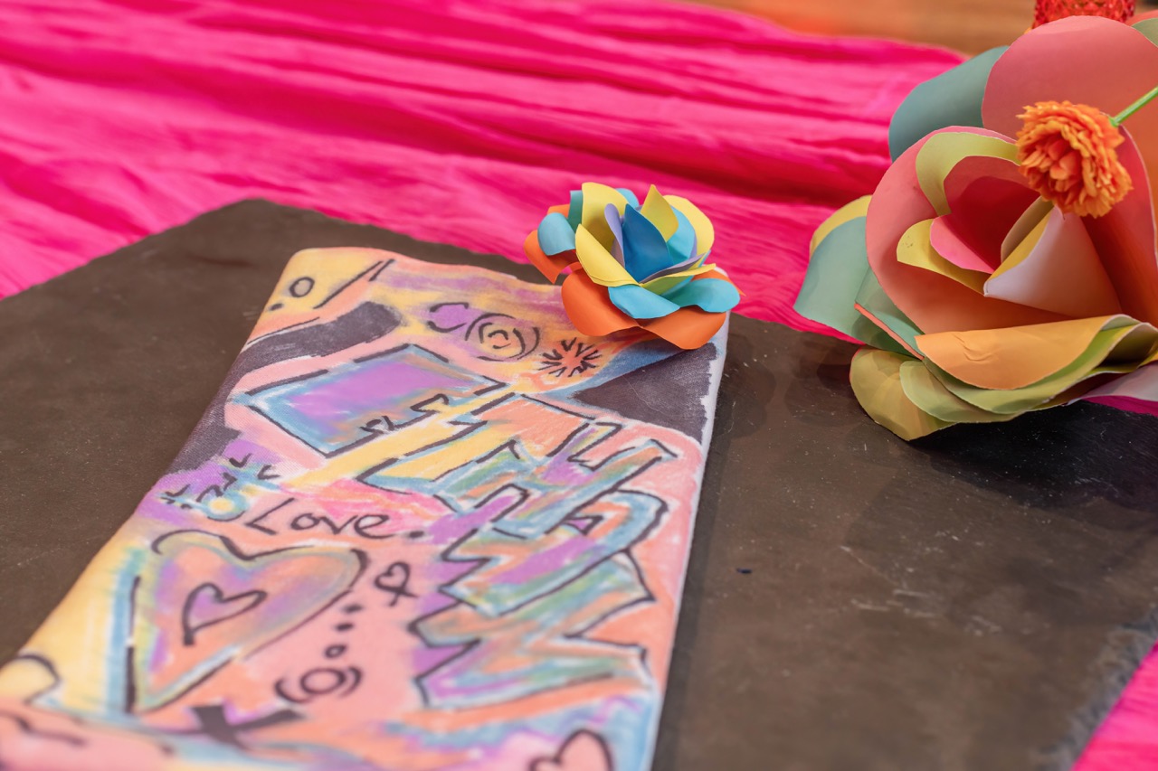 art deco style napkin with multicoloured paper flowers