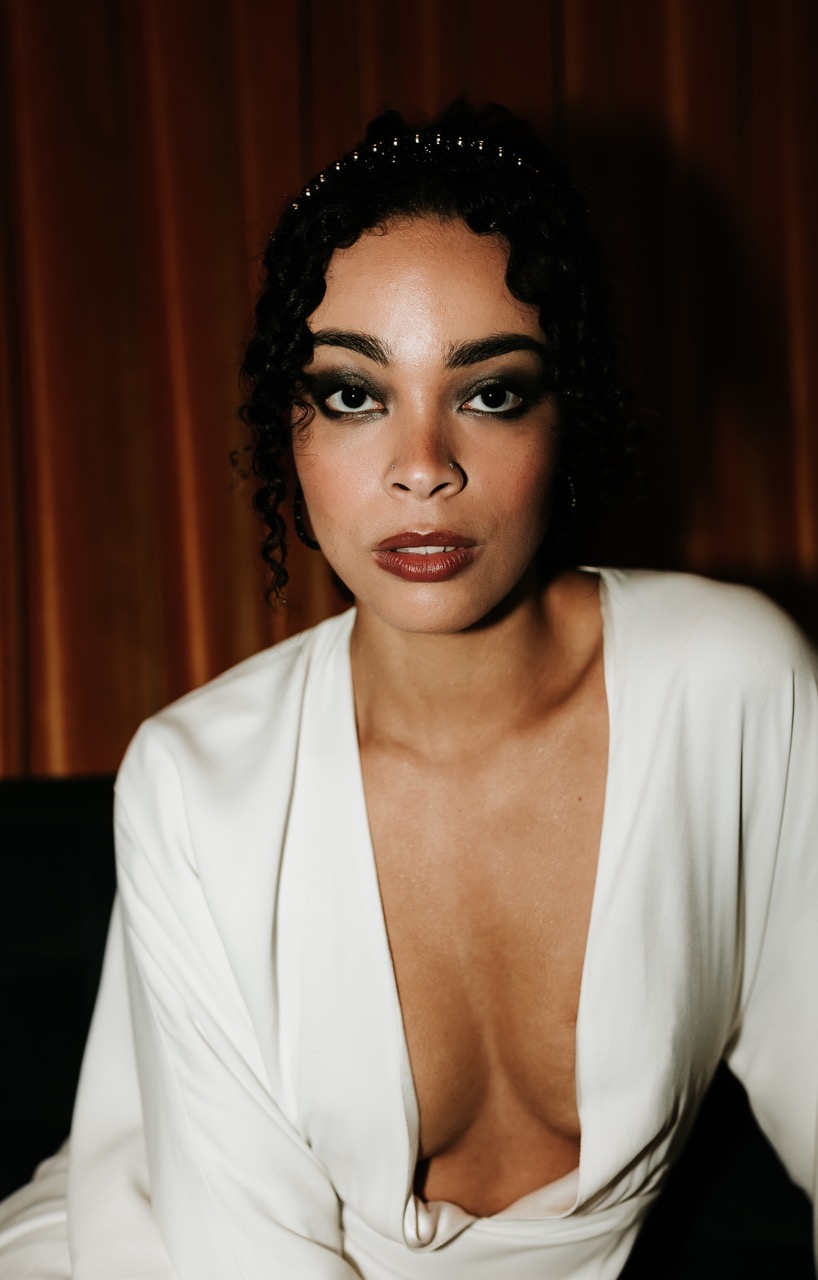 grungy bridal makeup with smokey eye and dark lip