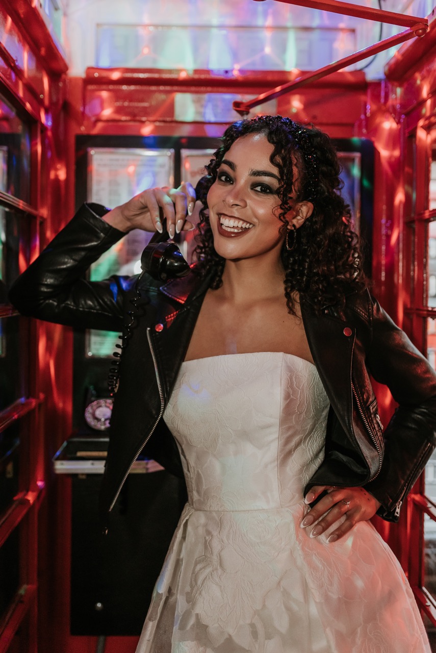 bride in phonebox at the venue on middle street, london wedding venue