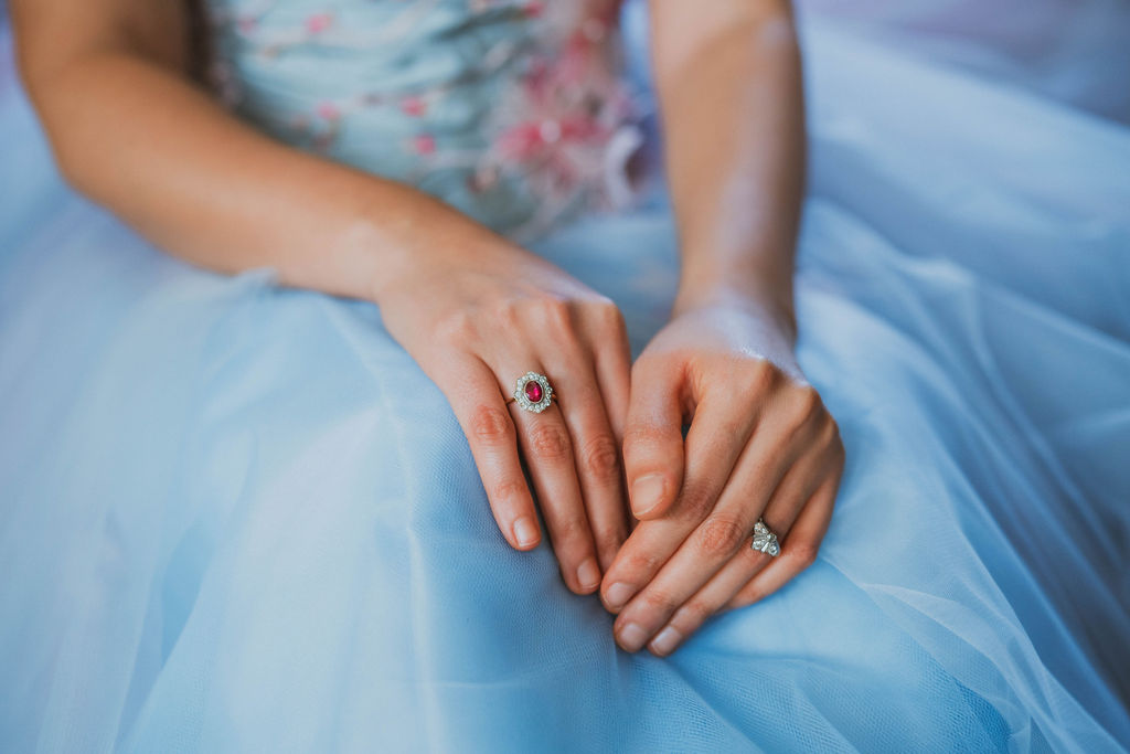 bride wearing vintage ruby wedding ring