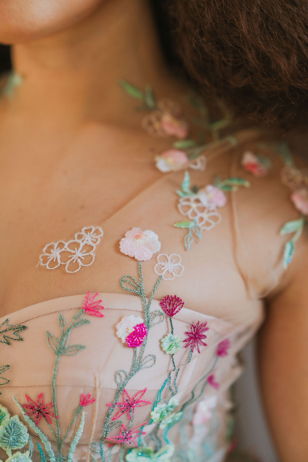 embroidered wedding dress with intricate floral detail