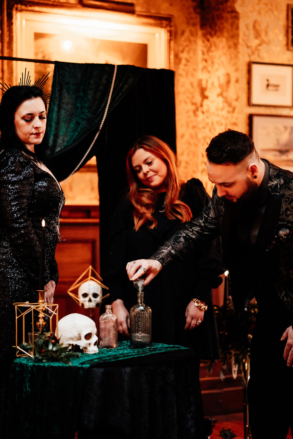 celebrant led sand mixing ceremony at gothic wedding