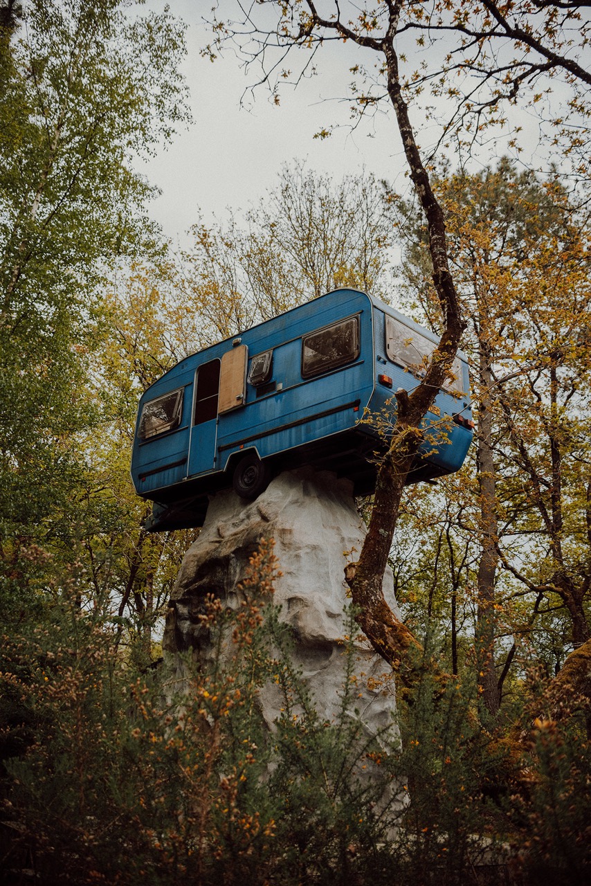 vintage blue campervan at french outdoor wedding venue