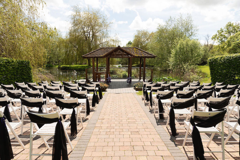 Ceremony space against a lake at wedding venue Wooton Park