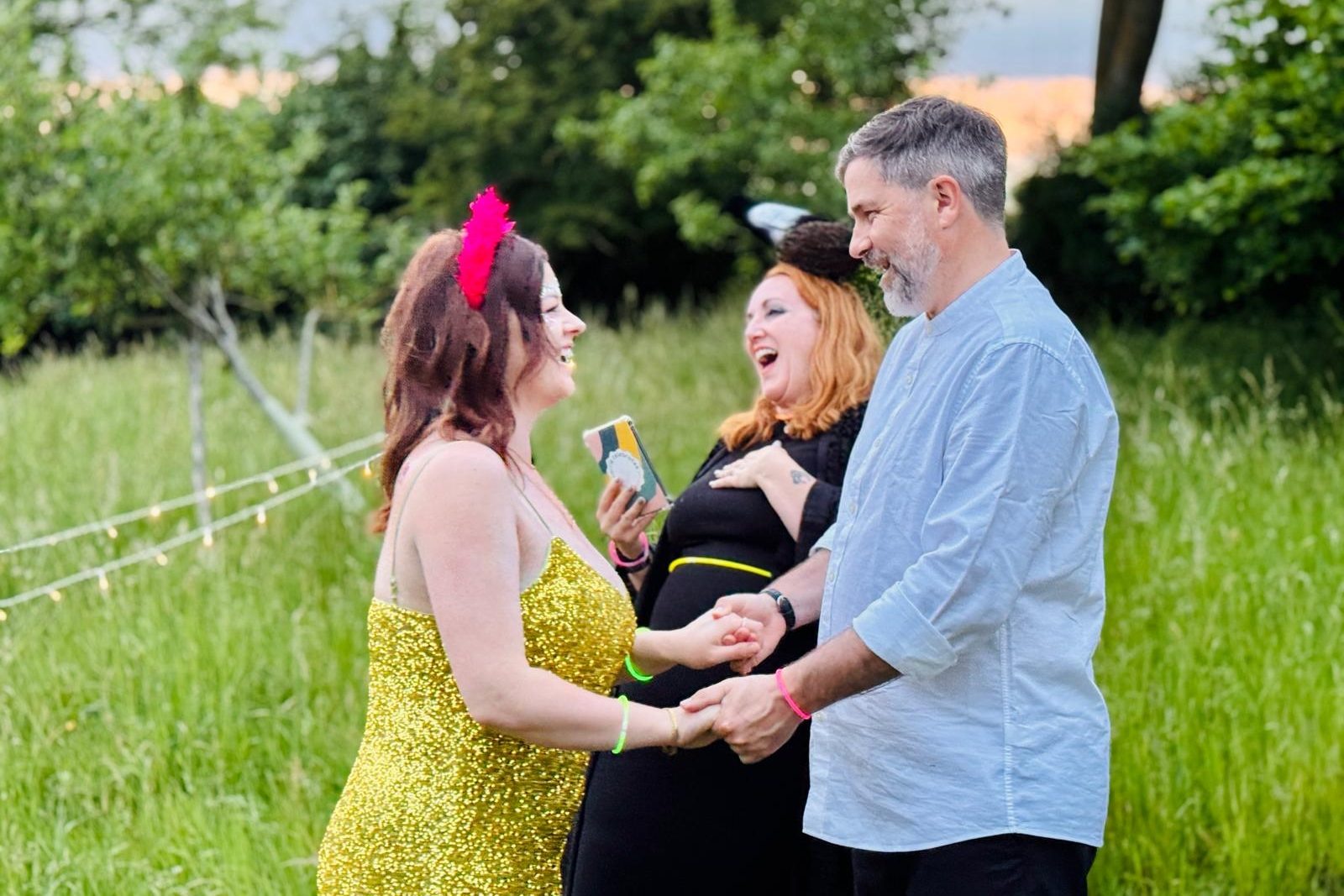 carrie celebrates marries a couple at an outdoor wedding