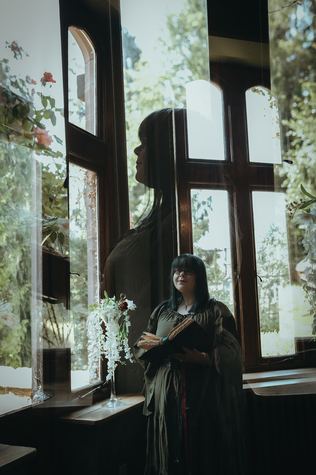 portrait of a wedding celebrant which has been created with a double exposure