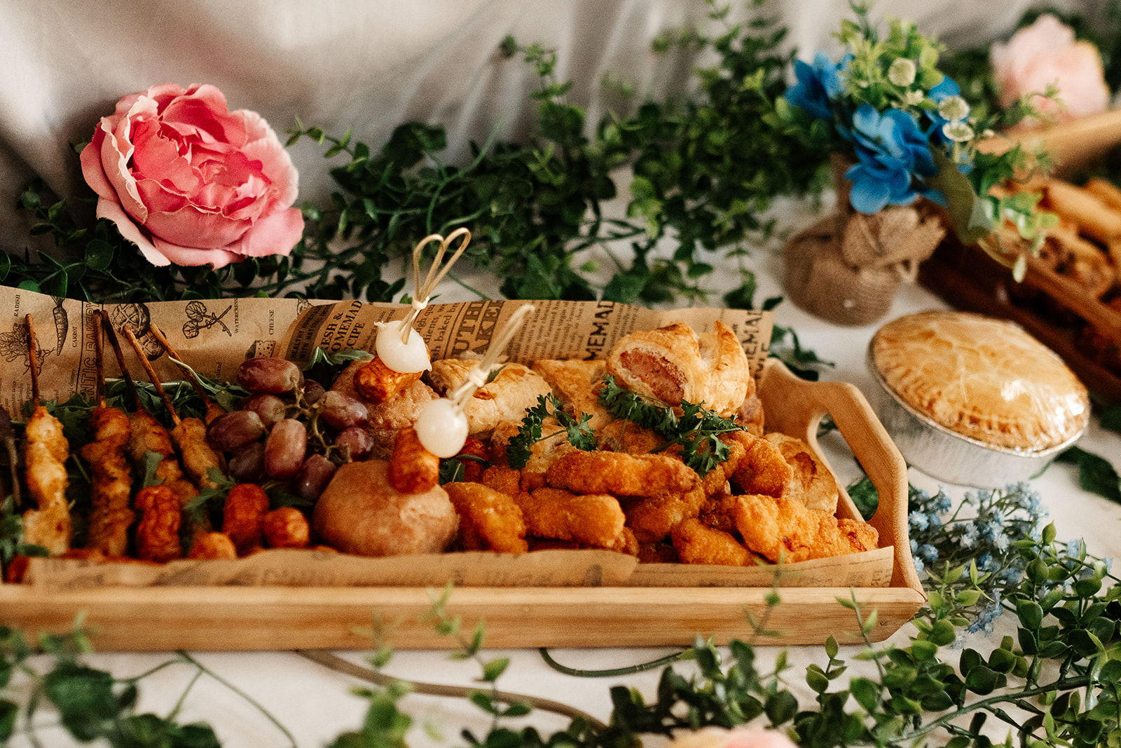 wedding grazing board with pies and mini kebabs