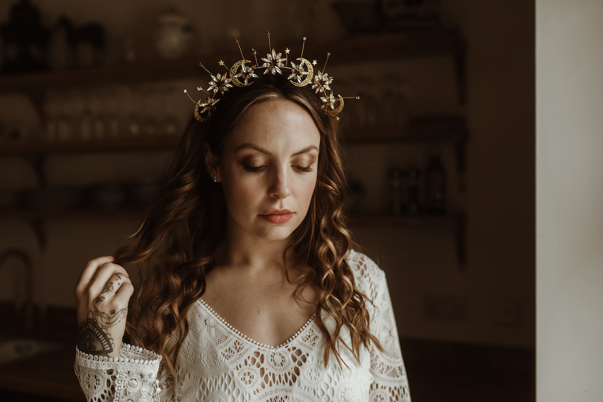 bride wears handmade bespoke bridal tiara by the lucky sixpence