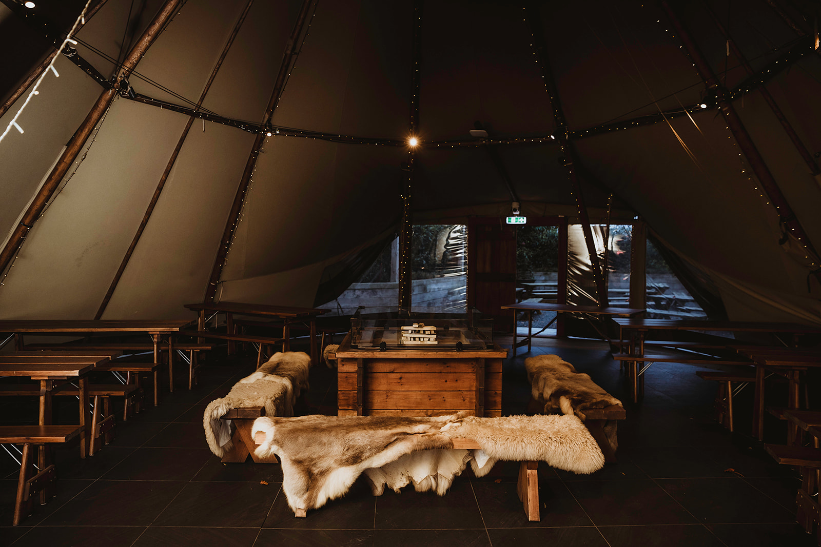 shot of the inside of a tipi at a forest wedding venue