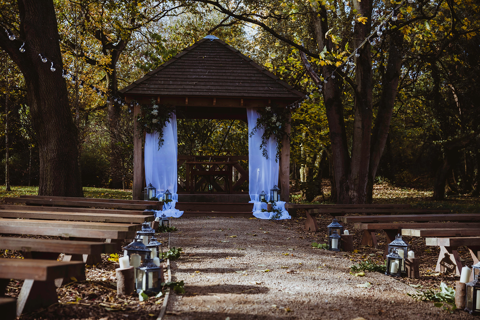 photo of the wooden ceremony structure set within a woodland as part of a viking wedding ceremony
