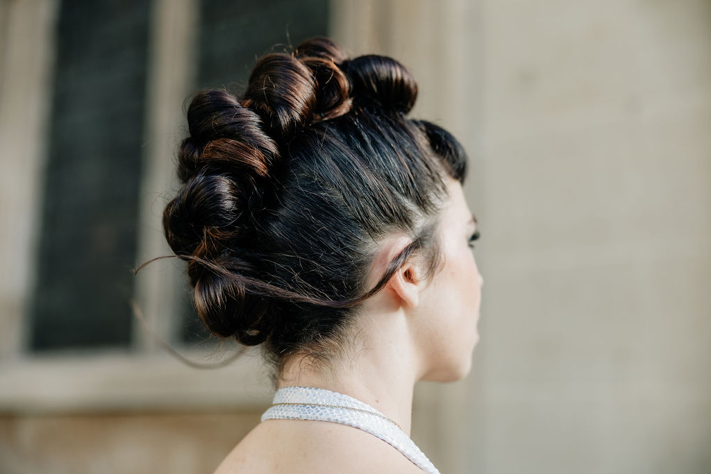 detail shot of brides braids which appear as a mohawk