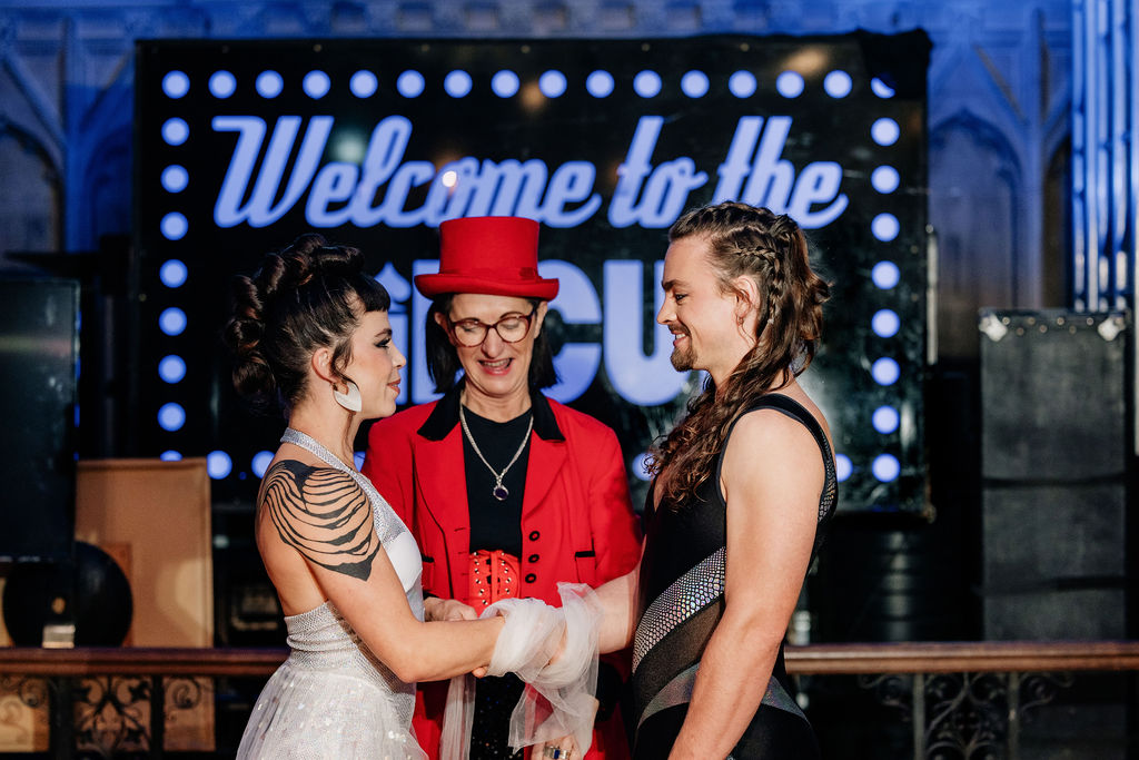 ring master celebrant performing a hand fasting ceremony