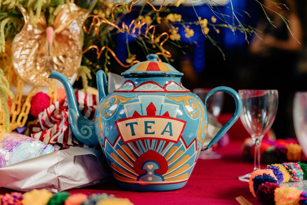 detail shot of fairground folk art inspired painted teapot