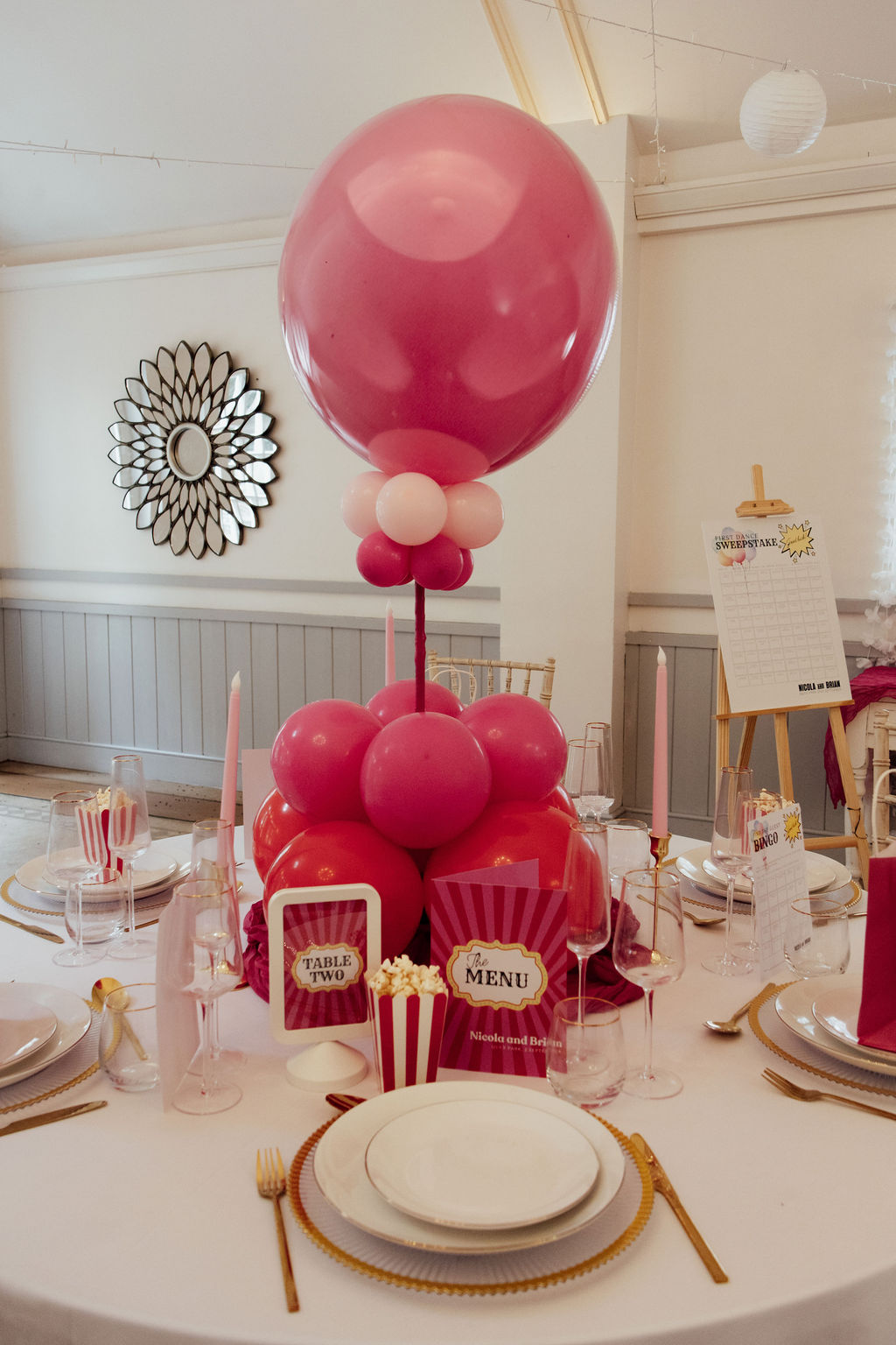 ballon centrepiece on carnival themed wedding breakfast table