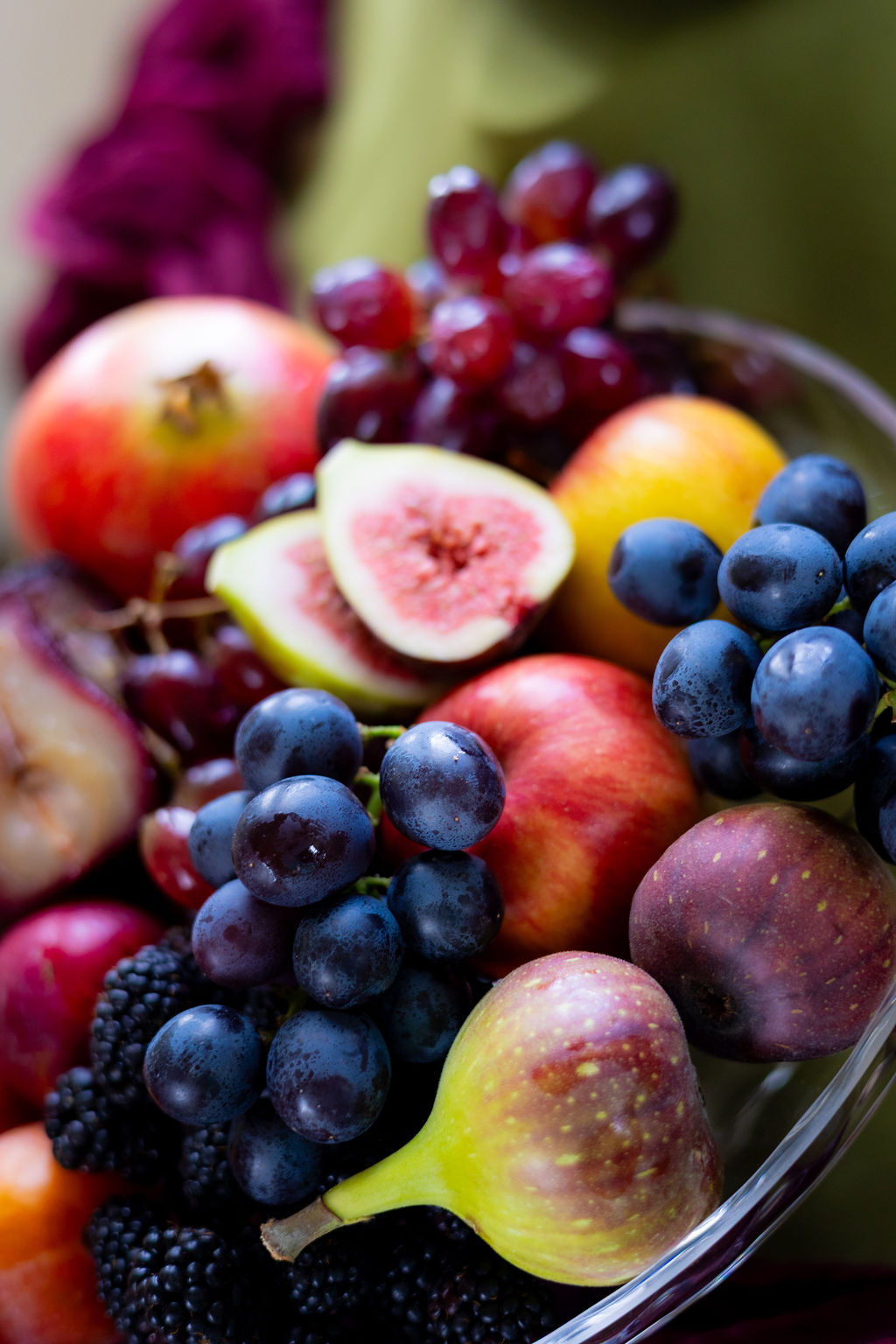 close up of fruit collection as Pre-Raphaelite inspired wedding breakfast table decor